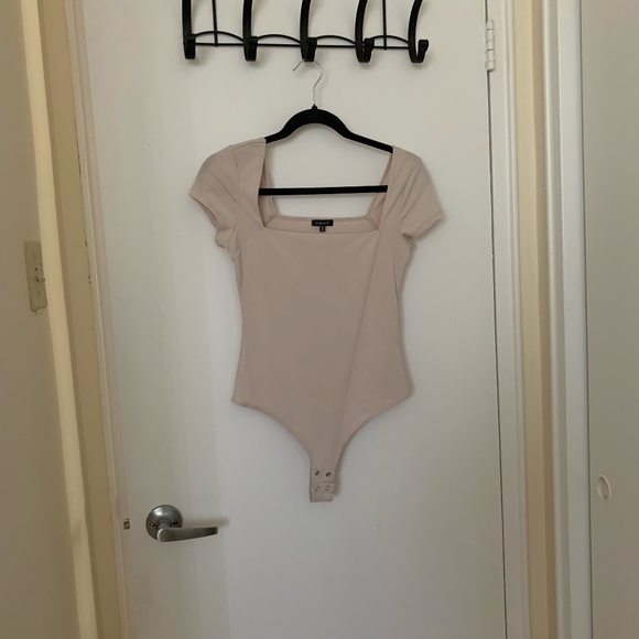 Dynamite White Bodysuit - Picture 2 of 3